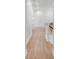Bright hallway with hardwood floors leads to the staircase and living area at 3554 Clambank Dr, Mount Pleasant, SC 29466