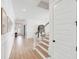 Long, naturally lit hallway with views into other rooms at 3554 Clambank Dr, Mount Pleasant, SC 29466
