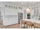 Open kitchen with stainless appliances, kitchen island, and white cabinets at 3554 Clambank Dr, Mount Pleasant, SC 29466