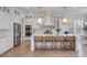 Bright kitchen island with seating, stainless appliances, and pendant lighting at 3554 Clambank Dr, Mount Pleasant, SC 29466