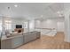 Second floor living room offers wood floors, natural light, and an open layout at 3554 Clambank Dr, Mount Pleasant, SC 29466