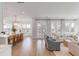 Spacious open-concept living space with waterfront view, blending modern kitchen and living room at 3554 Clambank Dr, Mount Pleasant, SC 29466