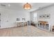 Bright playroom with desks and shelving provides an ideal creative and learning space at 3554 Clambank Dr, Mount Pleasant, SC 29466