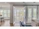 Relax on the porch, offering serene marsh views, seamlessly connecting indoor and outdoor living at 3554 Clambank Dr, Mount Pleasant, SC 29466