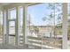 Scenic view of the marsh and waterway from the covered porch of this beautiful home at 3554 Clambank Dr, Mount Pleasant, SC 29466