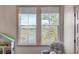 The bedroom window frames an exquisite marsh view, enhancing the home's natural appeal at 3554 Clambank Dr, Mount Pleasant, SC 29466