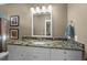 Bathroom with elegant granite countertop and ample storage space at 4008 Cameron Blvd, Isle of Palms, SC 29451