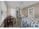 Comfortable bedroom with desk, sitting chair, and attached bathroom at 4008 Cameron Blvd, Isle of Palms, SC 29451