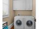 Convenient laundry room with a washer, dryer, and plenty of storage space at 4008 Cameron Blvd, Isle of Palms, SC 29451
