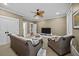 Spacious room offers comfortable seating, a ceiling fan, and a large television at 4008 Cameron Blvd, Isle of Palms, SC 29451