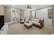 Comfortable living room with wicker furniture, neutral tones, and natural light at 4008 Cameron Blvd, Isle of Palms, SC 29451
