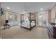 Spacious main bedroom with a four poster bed and access to balconies on both sides at 4008 Cameron Blvd, Isle of Palms, SC 29451
