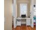Cozy office space with a desk, built-in shelves, and natural light at 4008 Cameron Blvd, Isle of Palms, SC 29451