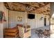 Covered outdoor area with comfortable seating, a television, and an inviting ambiance at 4008 Cameron Blvd, Isle of Palms, SC 29451