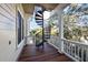 Elegant outdoor spiral staircase on a porch that offers beautiful views and architectural appeal at 4008 Cameron Blvd, Isle of Palms, SC 29451