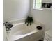 Cozy tub and shower combination provides a relaxing and functional bathroom space at 415 Aberdeen Cir, Summerville, SC 29483
