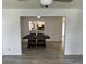 View of the dining room featuring a dark table and chairs open to the kitchen at 415 Aberdeen Cir, Summerville, SC 29483