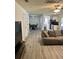 Living room view leading to dining area and kitchen with stainless appliances at 415 Aberdeen Cir, Summerville, SC 29483