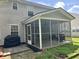 Cozy screened porch with comfortable seating and outdoor view at 415 Aberdeen Cir, Summerville, SC 29483