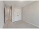 Neutral bedroom with carpet flooring and a view to another room at 416 Duskywing Dr, Goose Creek, SC 29445