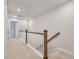 Second floor hallway featuring carpeted floor and white railing and wooden posts at 416 Duskywing Dr, Goose Creek, SC 29445