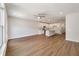 Spacious living room features wood-look floors, recessed lighting, modern ceiling fan and open to the kitchen at 416 Duskywing Dr, Goose Creek, SC 29445