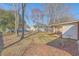 Lush backyard with mature trees provides shade and privacy at 417 Judy Dr, Goose Creek, SC 29445