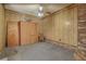 Bedroom with wood paneling, closet and ceiling fan at 417 Judy Dr, Goose Creek, SC 29445