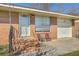 Charming front porch with brick steps and chairs at 417 Judy Dr, Goose Creek, SC 29445
