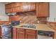 Kitchen with wood cabinets, sink, and dishwasher at 417 Judy Dr, Goose Creek, SC 29445