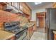 Kitchen featuring a range, brick backsplash, and sink at 417 Judy Dr, Goose Creek, SC 29445