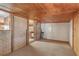 Spacious living room with brick accent wall and access to the kitchen at 417 Judy Dr, Goose Creek, SC 29445