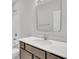 Bathroom vanity featuring wood cabinets, white quartz countertops, and a rectangle mirror at 419 Grove End Rd, Moncks Corner, SC 29461