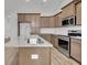 Modern kitchen featuring granite countertops, stainless steel appliances, and ample cabinet space at 419 Grove End Rd, Moncks Corner, SC 29461