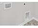 Unfinished laundry room with tile floors, white trim, and hookups for washer/dryer at 419 Grove End Rd, Moncks Corner, SC 29461