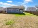 Expansive backyard featuring a covered patio and privacy fence at 431 Eva St, Moncks Corner, SC 29461