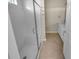 Modern bathroom featuring a glass-enclosed shower, sleek vanity, and tiled floor at 431 Eva St, Moncks Corner, SC 29461