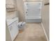 Bathroom featuring a white vanity, toilet, and tub with shower, complemented by tile flooring at 431 Eva St, Moncks Corner, SC 29461