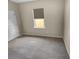 Comfortable carpeted bedroom featuring a window and neutral walls at 431 Eva St, Moncks Corner, SC 29461
