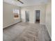 Bright main bedroom with soft carpet and ensuite bathroom and walk-in closet at 431 Eva St, Moncks Corner, SC 29461