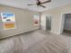 Spacious main bedroom with two windows and ensuite bathroom at 431 Eva St, Moncks Corner, SC 29461