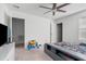 Open bedroom space featuring modern decor, a ceiling fan, and lots of natural light at 458 Pender Woods Dr, Summerville, SC 29486
