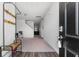 Inviting entryway with coat rack, bench and neutral-toned walls at 458 Pender Woods Dr, Summerville, SC 29486