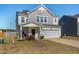 Attractive two-story home with gray and white siding, and a two-car garage at 458 Pender Woods Dr, Summerville, SC 29486