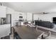 Open-concept kitchen featuring a center island with bar stool seating and modern appliances at 458 Pender Woods Dr, Summerville, SC 29486
