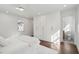 Spacious main bedroom featuring a walk-in closet, hardwood floors, and neutral tones at 511 Sarah St, Charleston, SC 29407