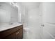 Bathroom features white tile floors, a bathtub with shower and a wooden vanity at 523 Eastern Isle Ave, Summerville, SC 29486