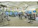 Bright gym featuring weight machines, treadmills, and TV screens for entertainment at 523 Eastern Isle Ave, Summerville, SC 29486