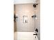 Modern bathroom with a sleek shower, white subway tiled walls, and stylish fixtures, blending functionality and design at 5273 Potomac St, North Charleston, SC 29405
