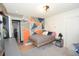 Contemporary bedroom with a unique suspended bed, complemented by modern décor and soft lighting for relaxation at 5273 Potomac St, North Charleston, SC 29405